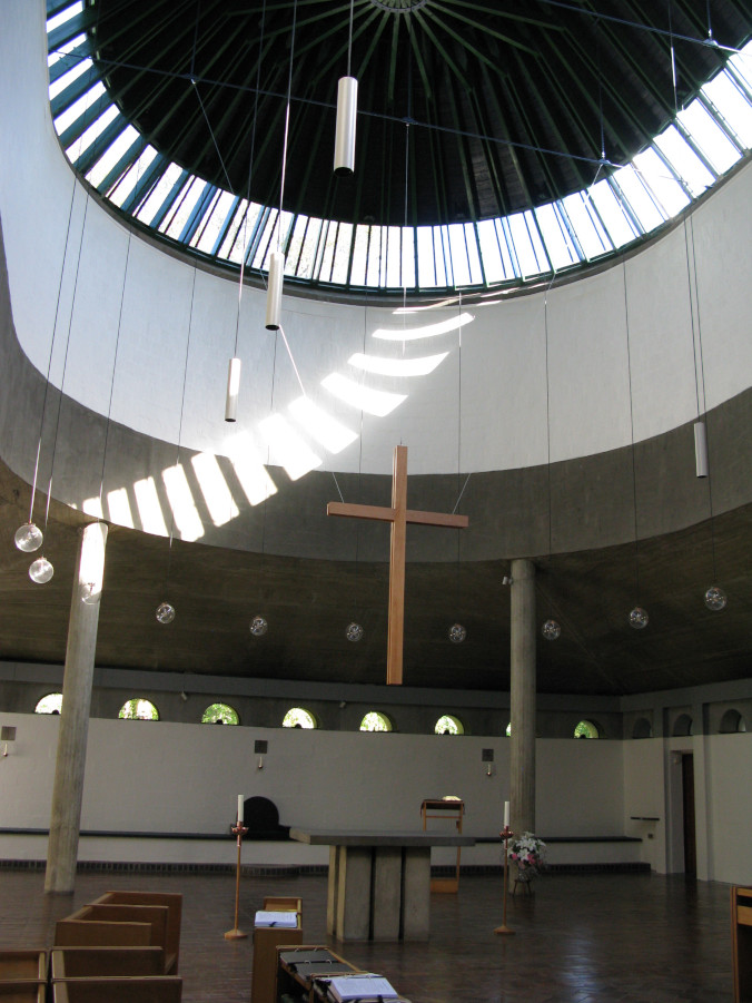 church with hanging cross and ladder of light