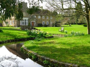 The Guest House and the stream